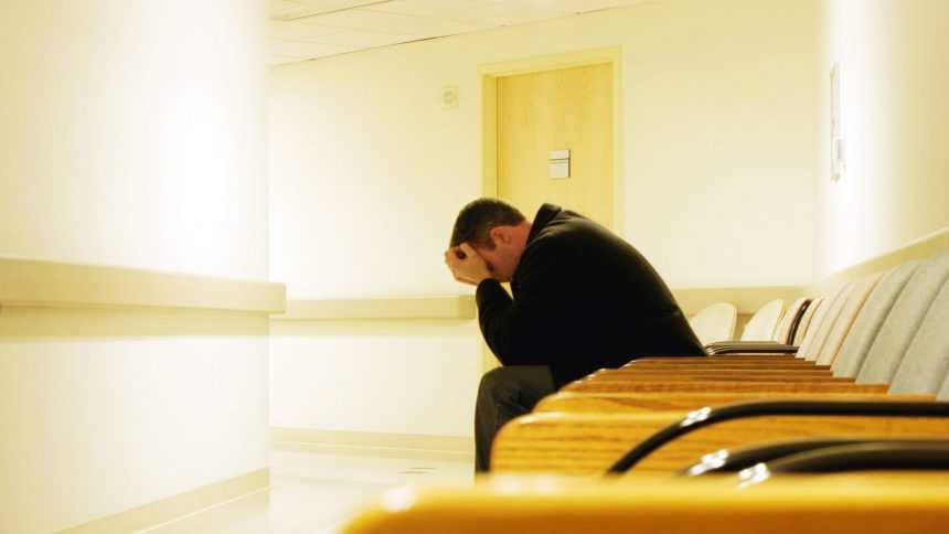 Image of main in hospital waiting room